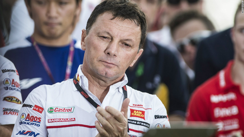 Fausto Gresini, team manager of San Carlo Honda Gresini, looks on struggling to hold back the tears. Simoncelli was the second rider Gresini has lost following the death of Japanese rider Daijiro Kato in a gruesome crash at Suzuka in 2003.