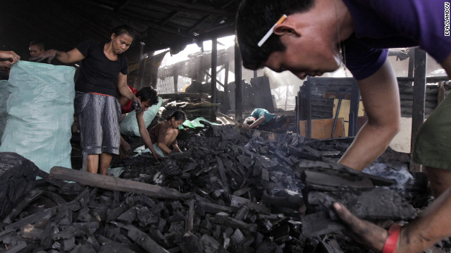 Photos Making Charcoal In A Manila Slum