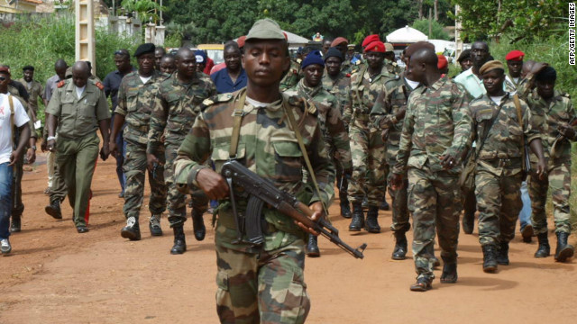 Soldiers walk in Guinea-Bissau&#39;s capital in 2012. 
