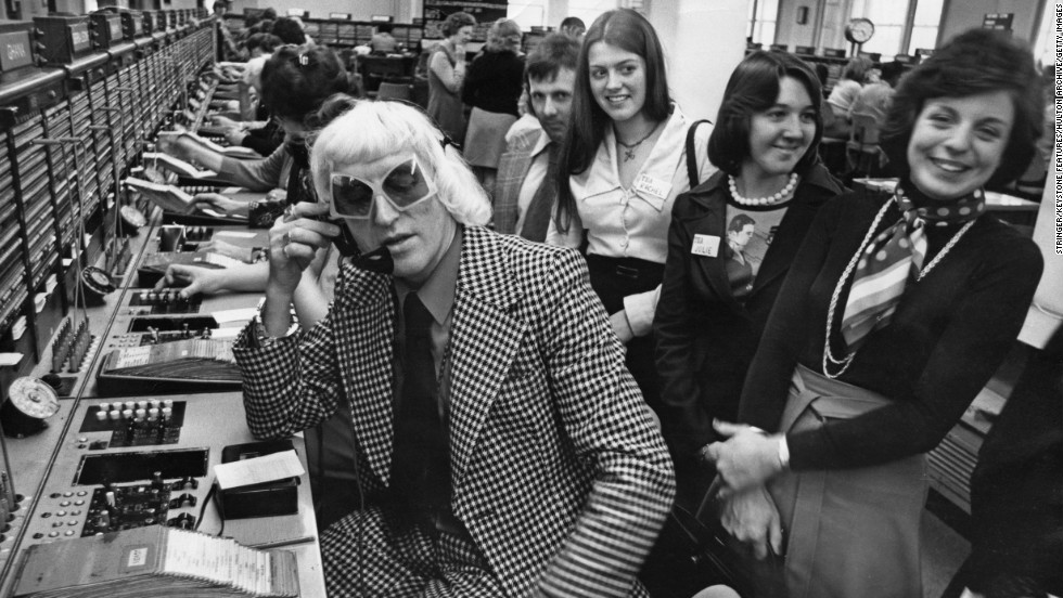Savile calls from the Wren House International Telephone Exchange in London in 1975 as part of a &quot;Fun And Happiness Weekend,&quot; organized by the National Association of Youth Clubs.