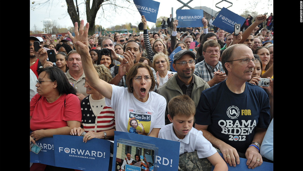 Supporters cheer as Obama speaks during a campaign event at Mississippi Valley Fairgrounds in Davenport, Iowa, Wednesday.