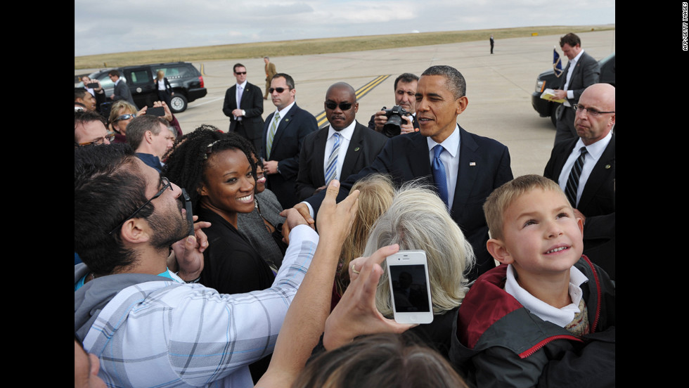 Obama greets people at Buckley Air Force Base in Aurora, Colorado, Wednesday.