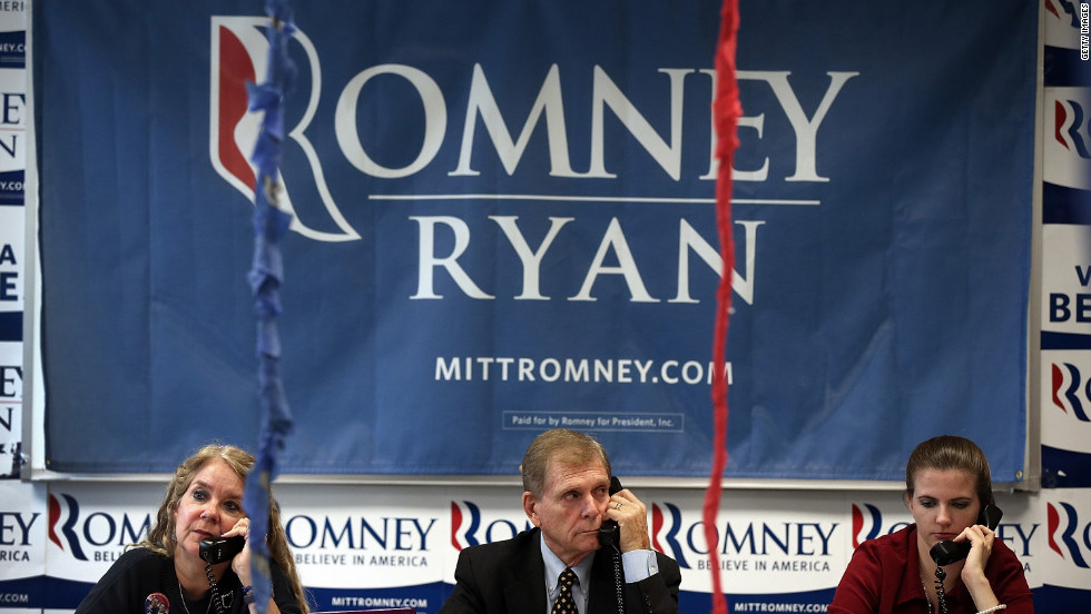 Volunteers make phone calls seeking support for Romney at his Arlington Victory Center in Virginia. 