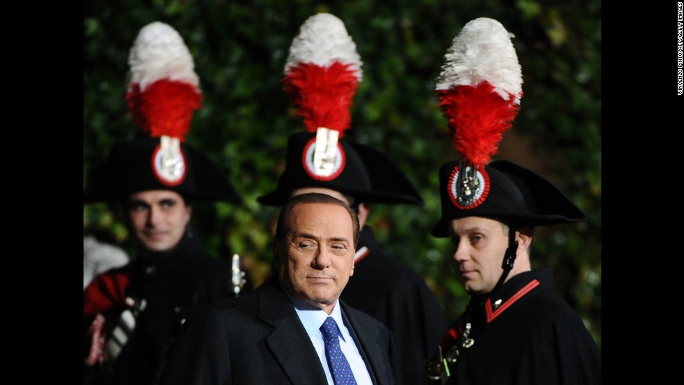 Berlusconi passes by Carabinieri guards before a meeting with Russia&#39;s President at Villa Madama in February 2011.