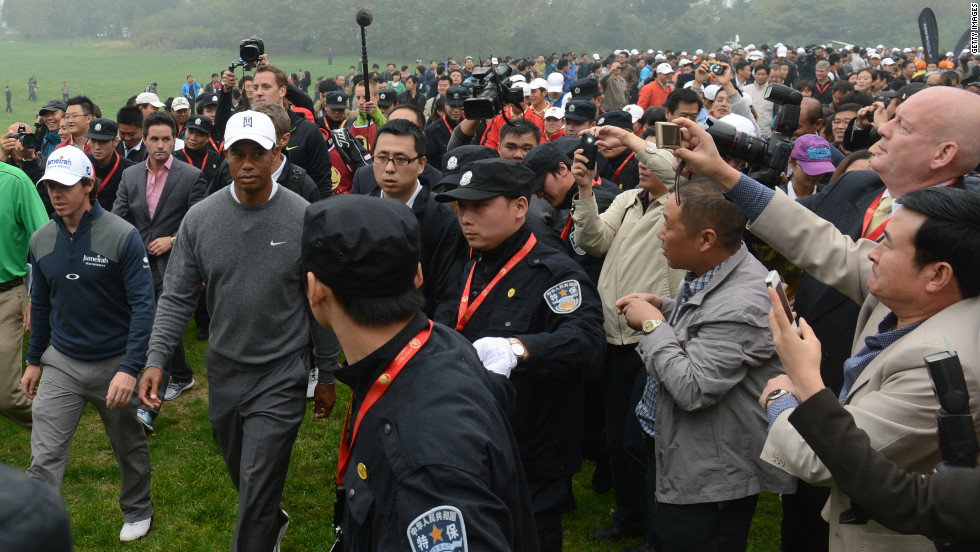 &quot;The scene was barely-controlled chaos,&quot; &lt;a href=&quot;http://blogs.golf.com/presstent/2012/10/tiger-woods-rory-mcilroy-set-for-duel-in-china.html&quot; target=&quot;_blank&quot;&gt;wrote Sports Illustrated&#39;s Alan Shipnuck&lt;/a&gt;. &quot;Some 3,000 fans streamed across the fairways, with soldiers locking arms in a human fence to keep the throngs off the greens.&quot; 