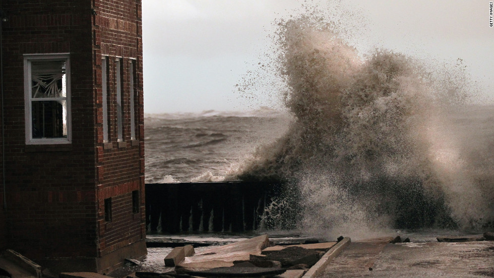 Waves break next to an apartment building in Atlantic City, New Jersey, on Tuesday. 