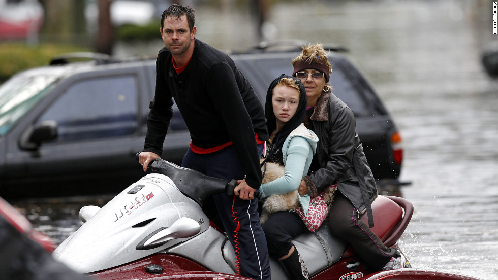 A resident of Little Ferry, New Jersey, assists in rescue efforts with his personal watercraft on Tuesday.