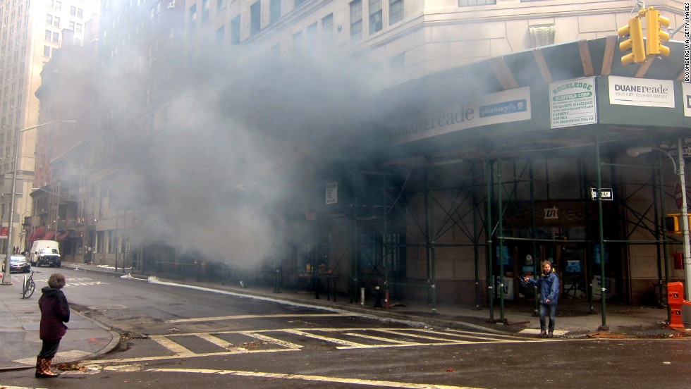 A malfunctioning generator billows black smoke at a building in New York on Tuesday.