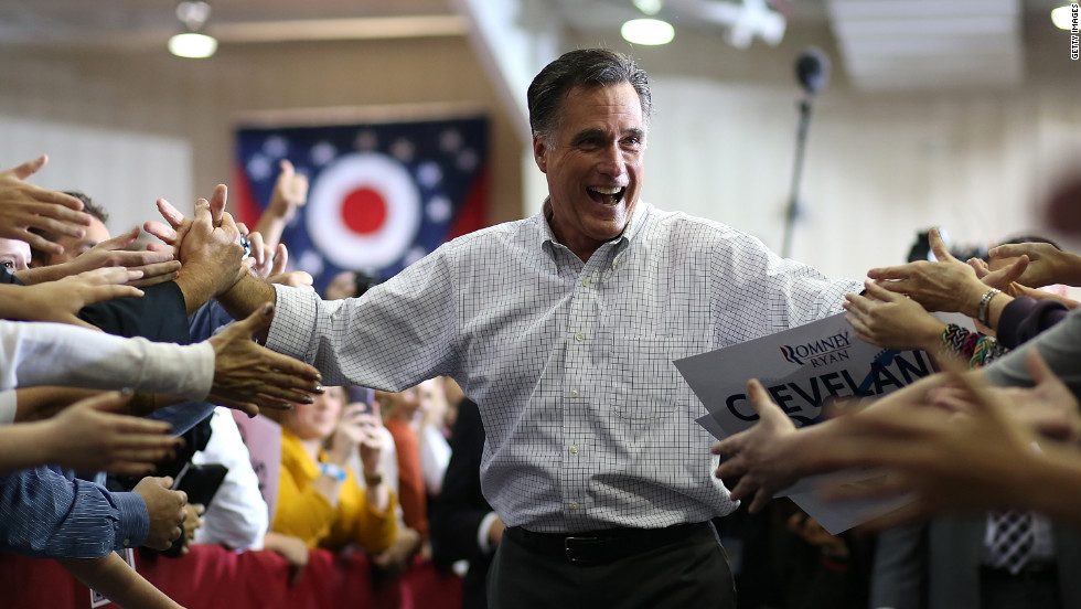 Romney greets supporters during a campaign rally at Avon Lake High School on Monday in Avon Lake, Ohio. Romney canceled other campaign events planned for Monday and Tuesday due to Hurricane Sandy.