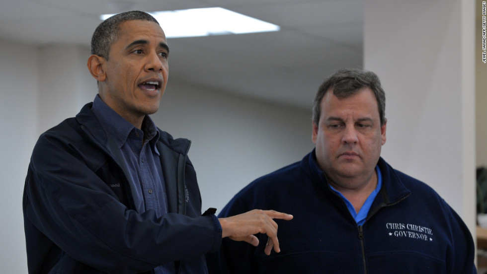 President Barack Obama speaks as New Jersey Gov. Chris Christie looks on, as they visit a shelter for Hurricane Sandy victims in Brigantine, New Jersey.