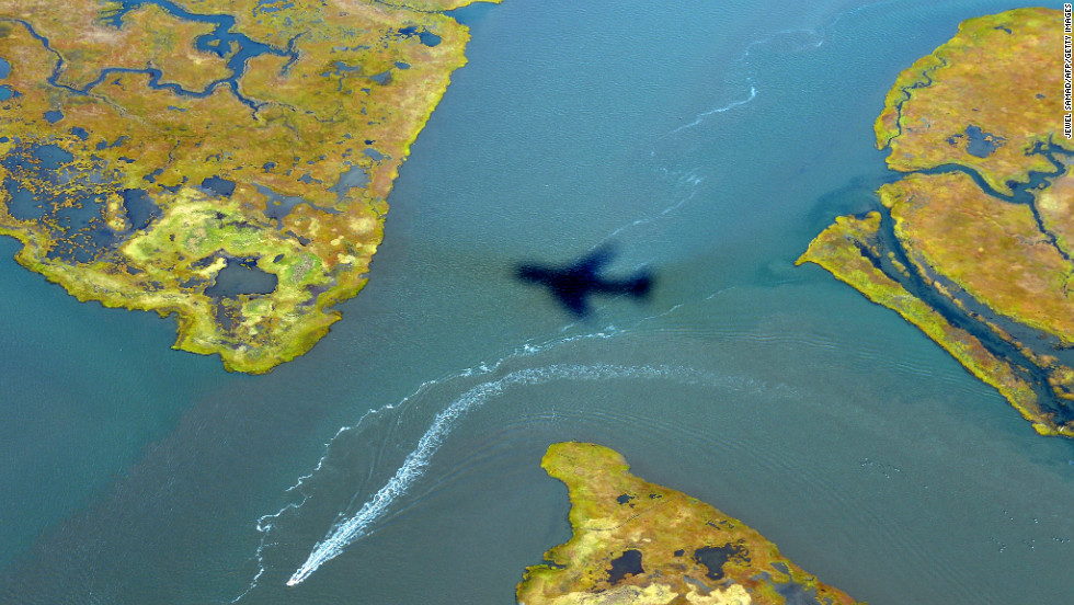 The shadow of Air Force One is cast on the water as it prepares to land in Atlantic City on Wednesday, October 31.