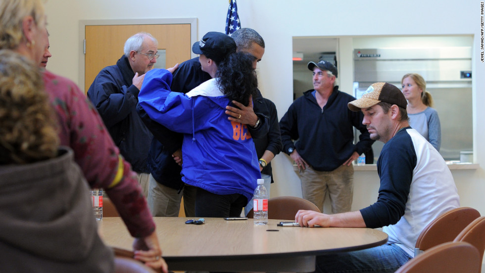 President Barack Obama greets and comforts victims of Hurricane Sandy at a shelter in Brigantine, New Jersey, on Wednesday, October 31.