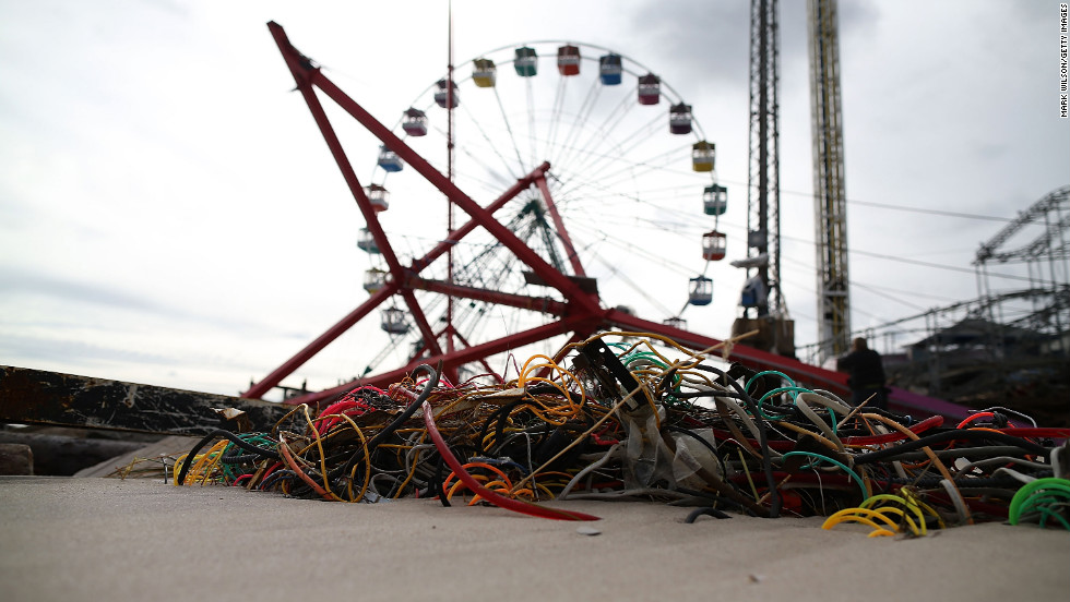 Amusement-park rides lie mangled on the beach after the Fun Town pier in Seaside Heights was destroyed.