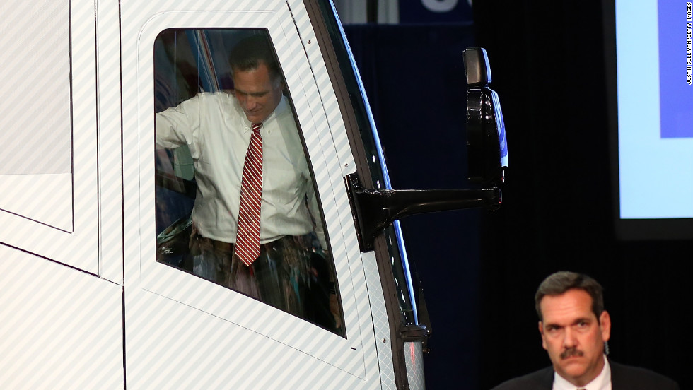 Romney gets ready to step off his campaign bus during an event Thursday, November 1, in Doswell, Virginia.