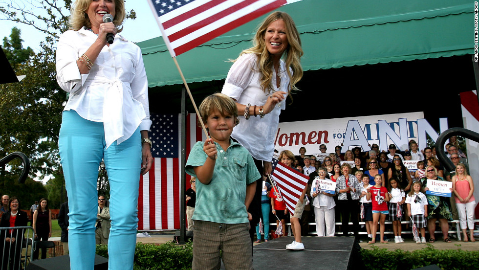 Ann Romney responds to cheering supporters with her grandson  Miles Romney and his mom, Mary Romney, in 2012.