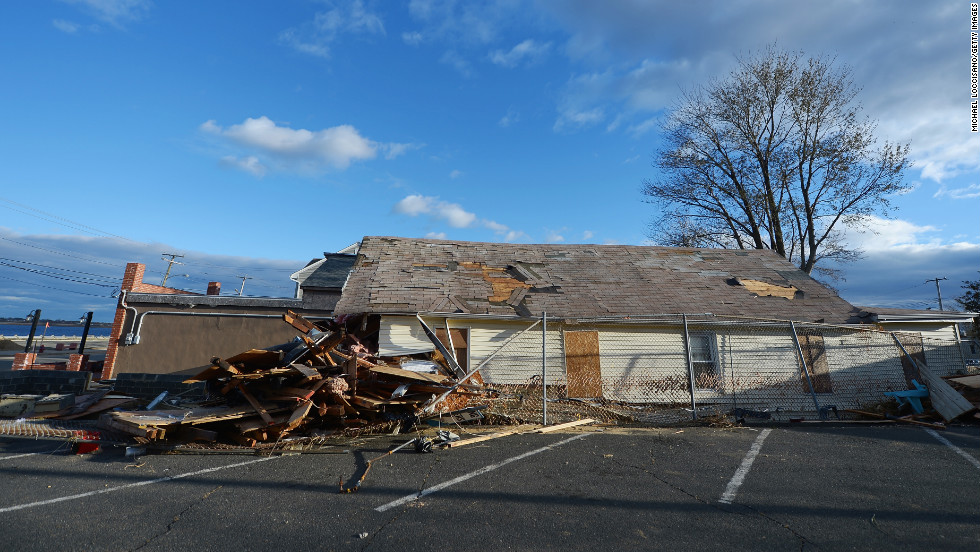 A house sits devastated by Superstorm Sandy on Friday, November 2, in Union Beach, New Jersey. The cost of the storm&#39;s damage in the U.S. is estimated at between $30 billion and $50 billion, according to disaster modeling firm Eqecat. 