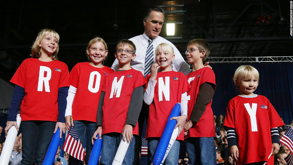 Romney meets some young supporters during a campaign rally at the Hy-Vee Center in Des Moines, Iowa, on Sunday.