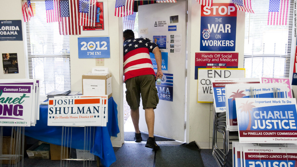 Volunteer David Bowser peeked outside the Pinellas County Democratic Party headquarters in St. Petersburg, Florida.