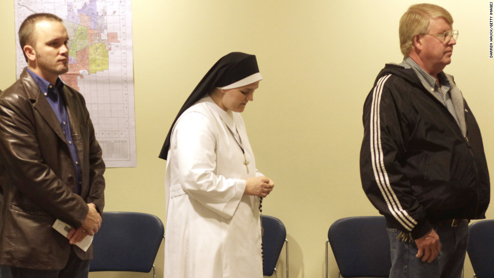 A nun waited in line to cast her vote in Janesville, Wisconsin.