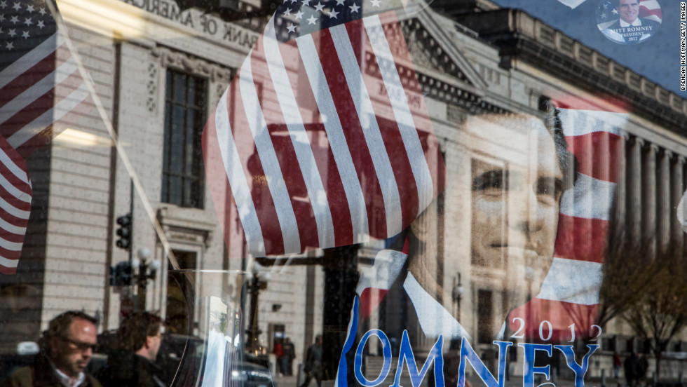 A street scene was reflected in the window of a gift shop near the White House in Washington, DC. 