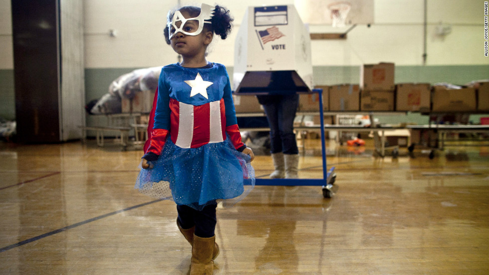 Raena Lamont, 3, wore a Captain America costume at a polling center Tuesday in Staten Island, New York. 