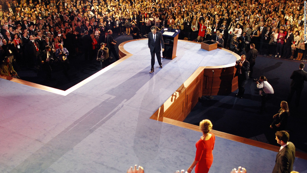 Mitt Romney slowly walked offstage in Boston after conceding the election to President Barack Obama.