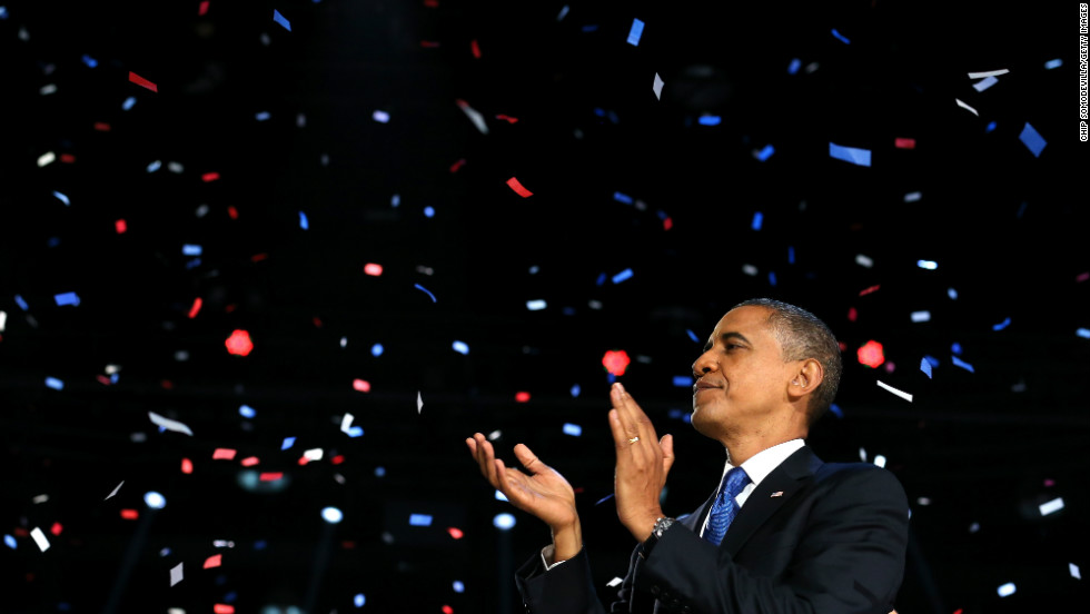 Red, white and blue confetti snowed down on President Barack Obama after a victory speech that promised brighter days ahead.