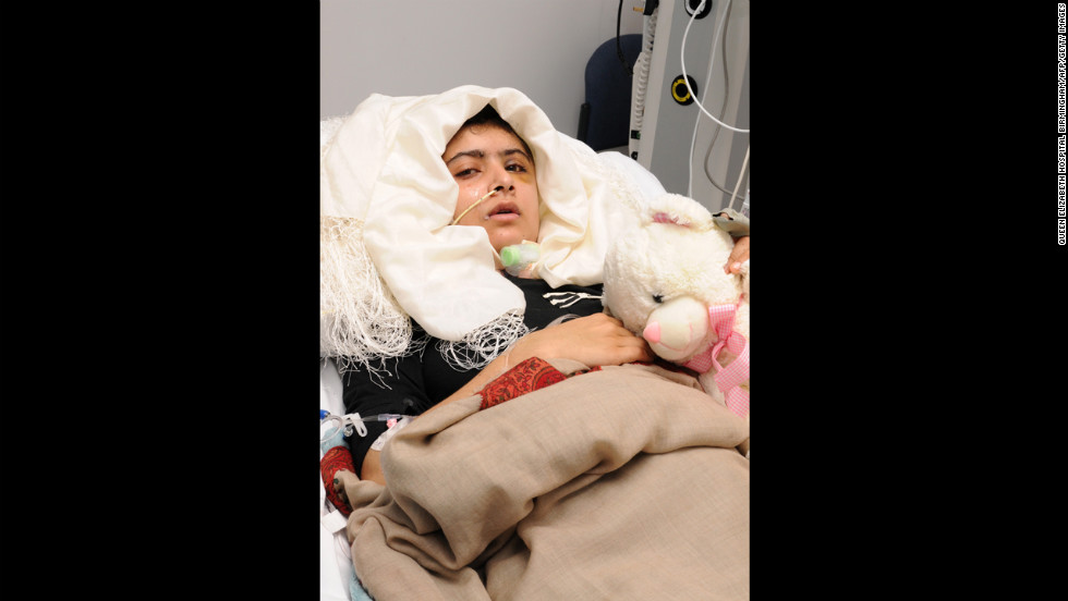 Malala recovers after receiving treatment at Queen Elizabeth Hospital in Birmingham on October 19, 2012. Doctors covered the large hole in her skull with a titanium plate. The teen suffered no major brain or nerve damage, and she even kept the piece of her skull that was removed as a souvenir of her fight. 