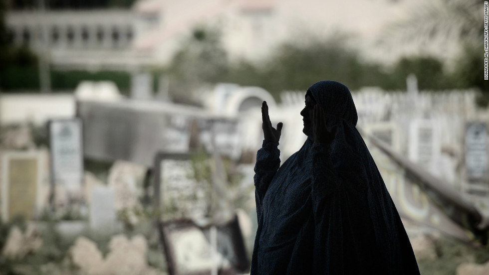 A Bahraini Shiite woman performs her weekly Friday prayers in the village of Diraz, west of Manama.
