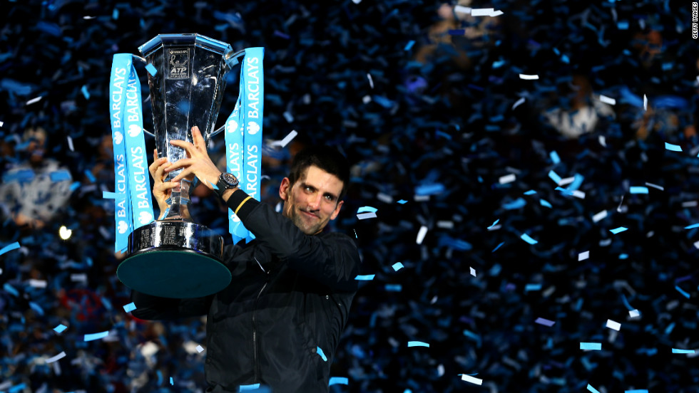 Novak Djokovic lifts the trophy at the 2012 ATP World Tour Finals after beating Roger Federer in a pulsating final. 