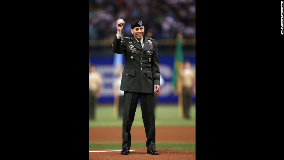 Petraeus acknowledges the fans before throwing out the ceremonial first pitch of the second game of the 2008 MLB World Series between the Philadelphia Phillies and the Tampa Bay Rays in October 2008 in Tampa.