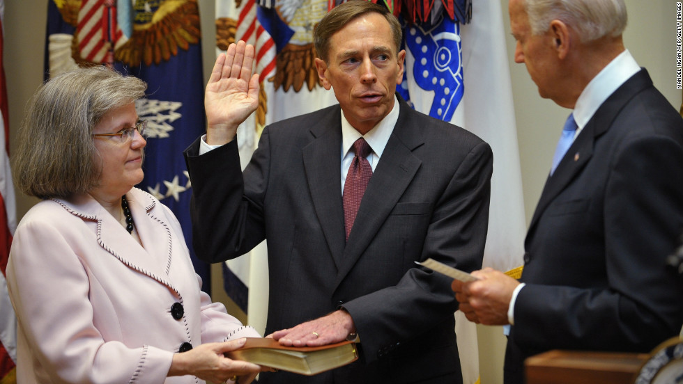 Petraeus takes the oath of office as the next director of the Central Intelligence Agency from Vice President Joe Biden as Petraeus&#39; wife Holly looks on in September 2011 in the Roosevelt Room of the White House.