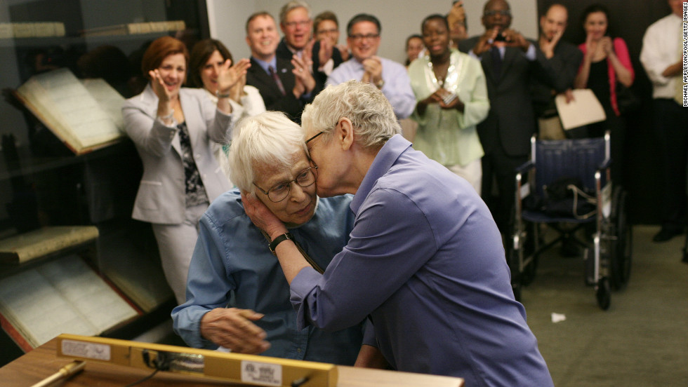 Phyllis Siegel, right, kisses her wife, Connie Kopelov, after exchanging vows at the Manhattan City Clerk&#39;s office on July 24, 2011, the first day New York&#39;s Marriage Equality Act went into effect.