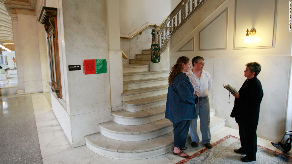 Amy Klein-Matheny, left, and her wife, Jennifer, exchange vows in Iowa after same-sex couples were allowed to marry there with an April 3, 2009, court ruling.