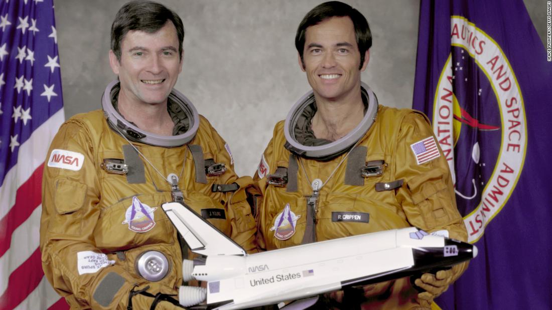 Columbia made the first orbital flight of NASA&#39;s space shuttle program on April 12, 1981. Here, crew members John Watts Young, left, and Robert Laurel Crippen hold a model of the orbiter in 1979. 