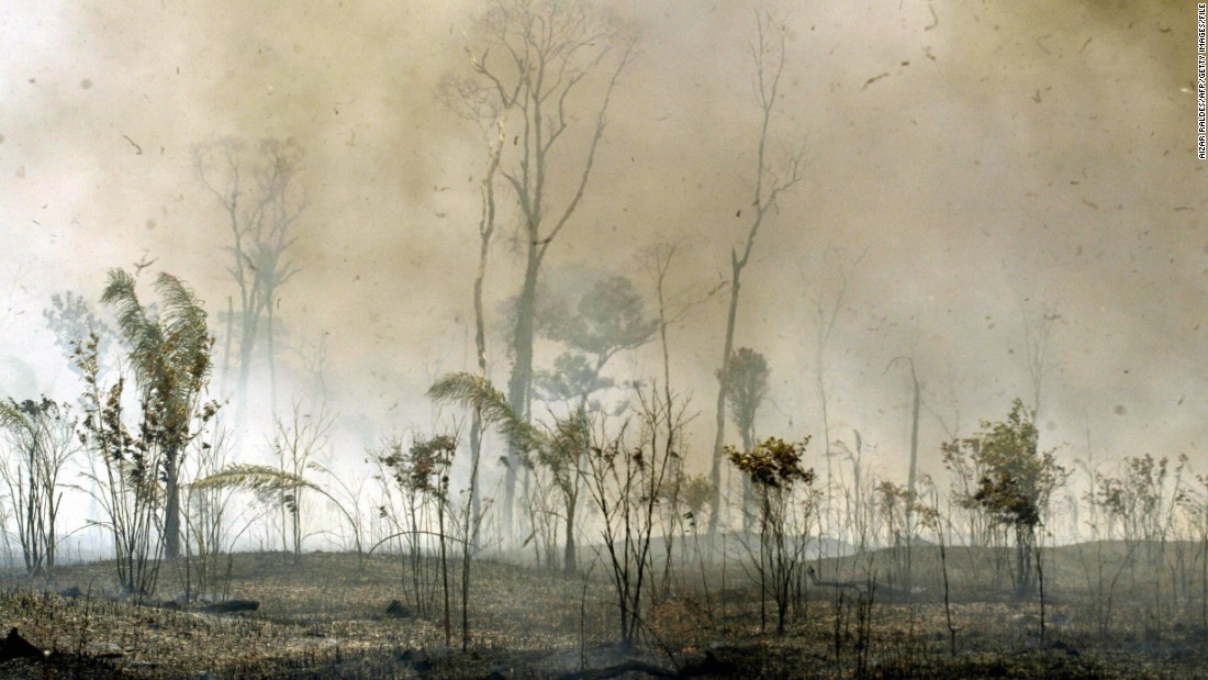 Riberalta, the largest town of Bolivia&#39;s Amazon region, is engulfed with fire during September 2005. The Amazon region saw widespread wildfires that turned the rainforest into a carbon source rather than a carbon sink. 