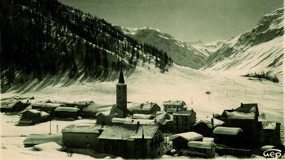 Val d&#39;Isere is a small village that became an internationally renowned ski resort. This picture, from 1896, shows its humble origins, as a handful of homes cluster round its 11th century church.