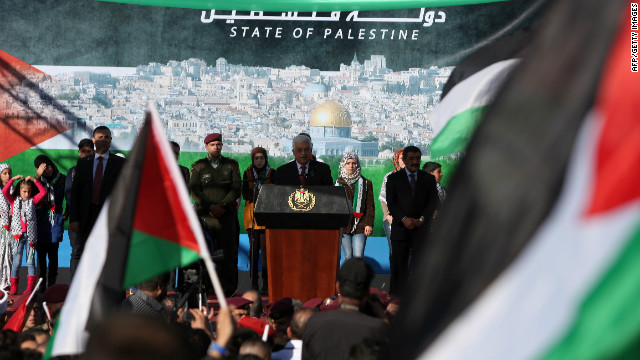 Palestinian Authority President Mahmoud Abbas speaks upon his arrival in the West Bank city of Ramallah on December 2.
