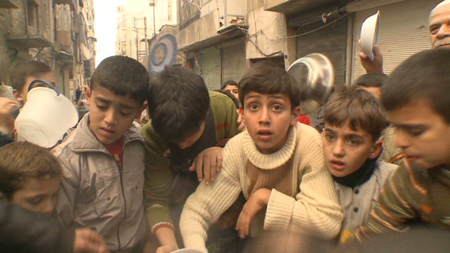 Children fight for food in Aleppo  