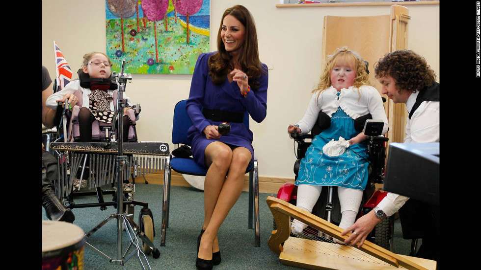 Catherine joins in a music class during a visit to The Treehouse in Ipswich, eastern England, on March 19, 2012. Her visited marked the formal opening of The Treehouse, a children&#39;s hospice service for the counties of Suffolk and Essex. 