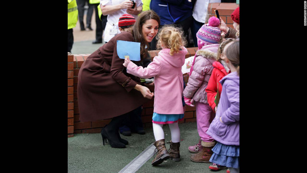 Catherine greets a young girl during a walkabout as she visits Alder Hey Children&#39;s Hospital on February 14, 2012, in Liverpool, England. 