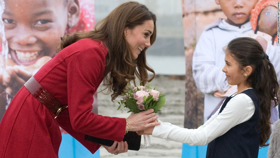 Catherine receives a bouquet of flowers from a young girl during her visit to the UNICEF Centre on November 2, 2011, in Copenhagen, Denmark. 