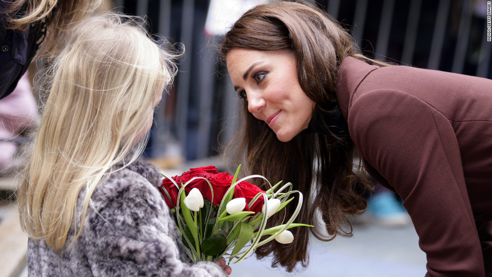 Catherine talks with a young girl as she arrives for a visit to Alder Hey Children&#39;s Hospital on February 14, 2012, in Liverpool, England. 