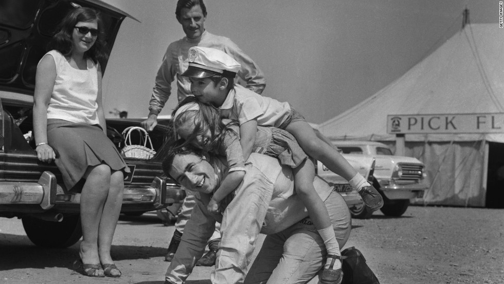 Former world champion Jackie Stewart, seen here playing with the children of F1 rival Graham Hill, was remarkably friendly with his peers, Tu says. &quot;He was incredibly fond of a number of people who drove with him. That partly is because there was a clearer distinction of him being a number one and them being number two drivers.&quot;