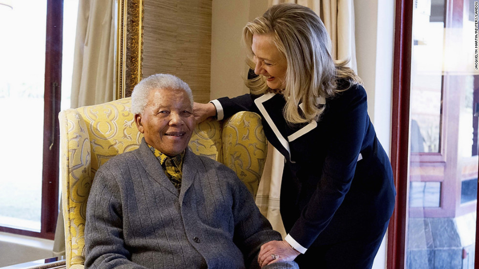 Then-U.S. Secretary of State Hillary Clinton meets with Mandela at his home in Qunu, South Africa, on August 6, 2012.