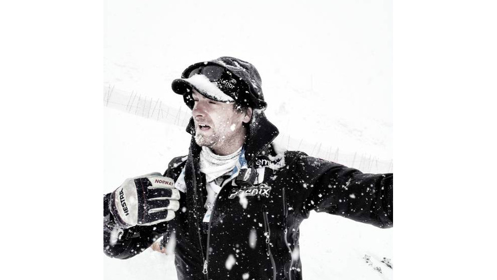 Norwegian ski coach Haavard Lie battles the elements during national team training in Solden.