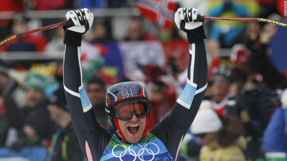 Svindal celebrates his silver medal in the men&#39;s downhill in Vancouver. He also won bronze in the giant slalom to complete a full set of medals in one Games. 