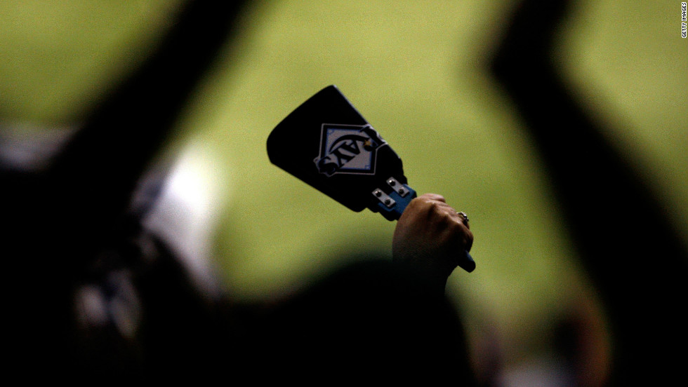 Cycling and triathlon are increasingly the domain of the cowbell. Tennis racket manufacturers gave away branded versions at the U.S. Open. Here a fan of the Tampa Bay Rays is pictured holds up a cow bell during game one of the 2008 MLB World Series against the Philadelphia Phillies.