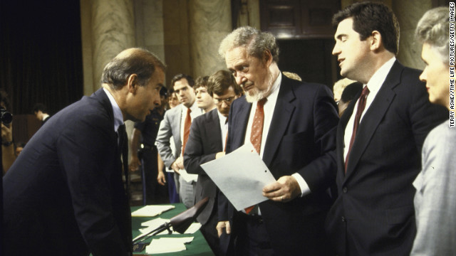 Senate Judiciary Committee Chairman Joseph R. Biden Jr., chatting with Supreme Court Nominee Robert H. Bork and others; after first day of hearings to confirm Bork.  (Photo by Terry Ashe//Time Life Pictures/Getty Images)