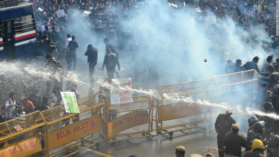 Police unleash water cannon and fire tear gas towards demonstrators on December 22.